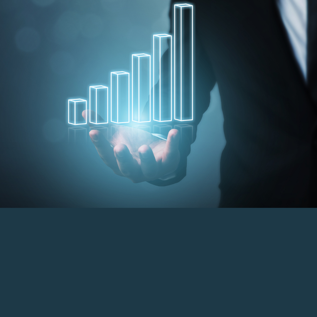 Hand holding a bar graph